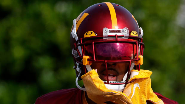 Commanders cornerback William Jackson III (3) walks to the field ahead of a training camp practice.