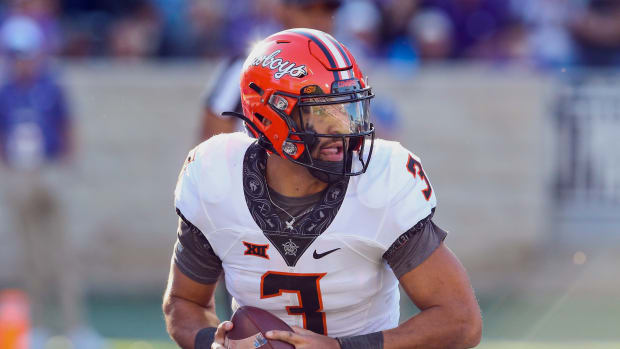 Oct 29, 2022; Manhattan, Kansas, USA; Oklahoma State Cowboys quarterback Spencer Sanders (3) drops back to pass against the Kansas State Wildcats during the first quarter at Bill Snyder Family Football Stadium
