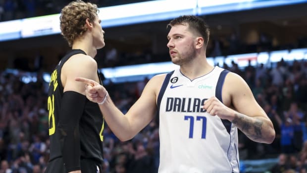 Nov 2, 2022; Dallas, Texas, USA; Dallas Mavericks guard Luka Doncic (77) reacts in front of Utah Jazz forward Lauri Markkanen (23) after the game at American Airlines Center. Mandatory Credit: Kevin Jairaj-USA TODAY Sports