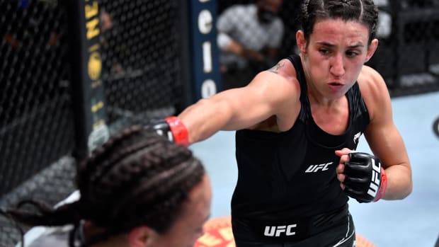 Marina Rodriguez of Brazil punches Michelle Waterson in a flyweight fight during the UFC Fight Night event at UFC APEX on May 08, 2021 in Las Vegas, Nevada.