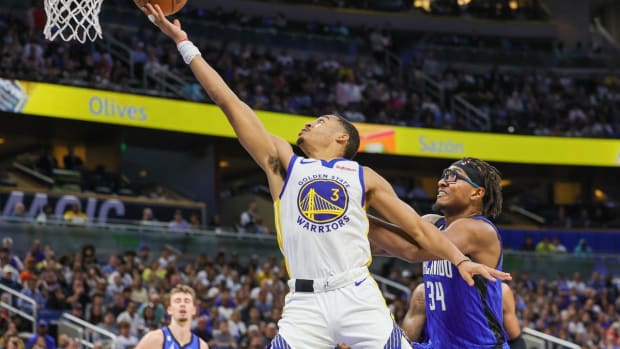 Nov 3, 2022; Orlando, Florida, USA; Golden State Warriors guard Jordan Poole (3) goes to the basket in front of Orlando Magic center Wendell Carter Jr. (34) during the second quarter at Amway Center. Mandatory Credit: Mike Watters-USA TODAY Sports