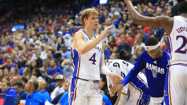 Kansas freshman guard Gradey Dick (4) returns to the bench during the second half of Thursday's game against Pitt State inside Allen Fieldhouse.