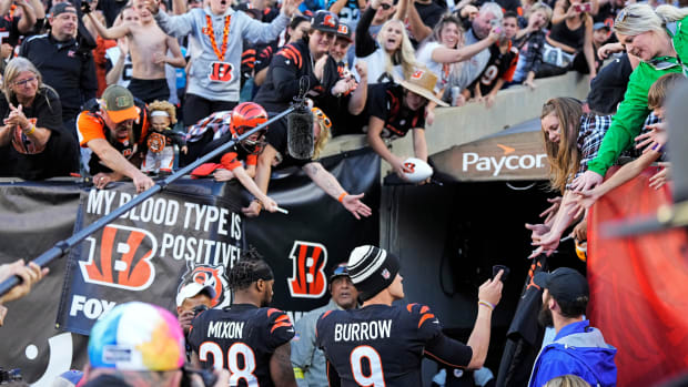 Cincinnati Bengals running back Joe Mixon (28) and quarterback Joe Burrow (9) walk for the locker room after the fourth quarter during a Week 9 NFL game, Sunday, Nov. 6, 2022, at Paycor Stadium in Cincinnati. Mandatory Credit: Sam Greene-The Enquirer Nfl Carolina Panthers At Cincinnati Bengals