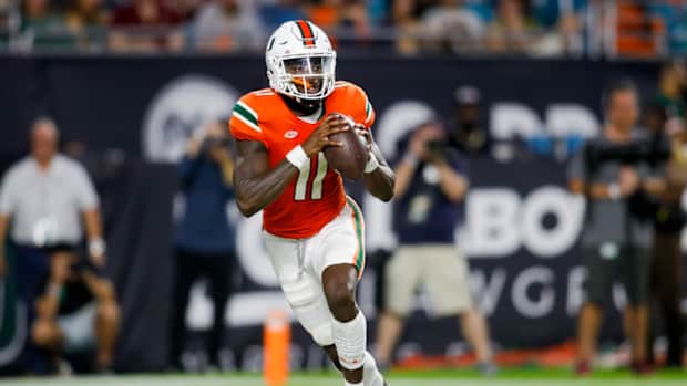 Miami Hurricanes quarterback Jacurri Brown (11)