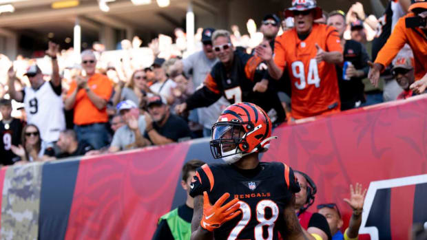 Cincinnati Bengals running back Joe Mixon (28) celebrates after scoring his fifth touchdown in the third quarter during a Week 9 NFL game, Sunday, Nov. 6, 2022, at Paycor Stadium in Cincinnati. Mandatory Credit: Albert Cesare-The Enquirer Nfl Carolina Panthers At Cincinnati Bengals