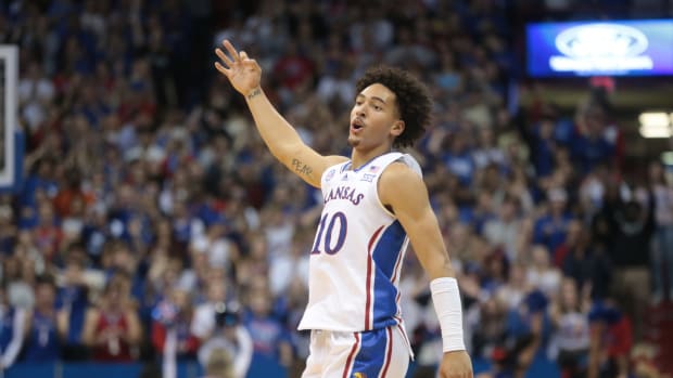 Kansas redshirt junior forward Jalen Wilson (10) throws three fingers after sinking a long three-pointer in the first half of Thursday's game against North Dakota State inside Allen Fieldhouse.
