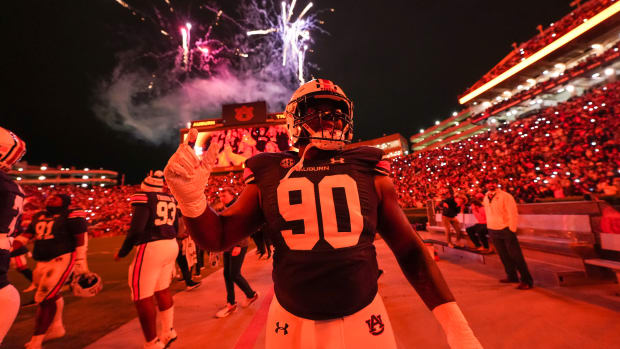 Enyce Sledge (90) walking out into the fourth quarter during the football game between the Texas A&M Aggies and the Auburn Tigers at Jordan Hare Stadium in Auburn, AL on Saturday, Nov 12, 2022. Austin/Auburn Tigers generic