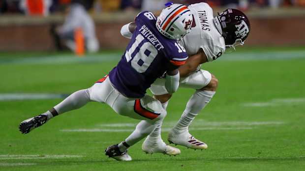 Nehemiah Pritchett makes a tackle vs Texas A&M.