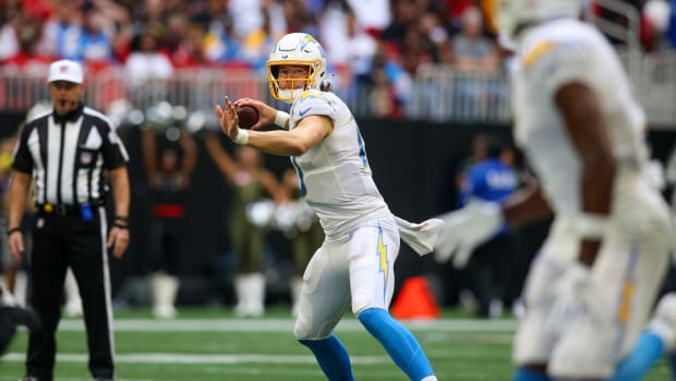 Nov 6, 2022; Atlanta, Georgia, USA; Los Angeles Chargers quarterback Justin Herbert (10) throws against the Atlanta Falcons in the second half at Mercedes-Benz Stadium. Mandatory Credit: Brett Davis-USA TODAY Sports