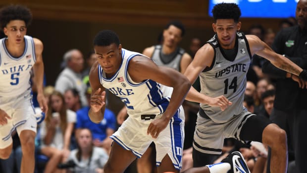 Nov 11, 2022; Durham, North Carolina, USA; Duke Blue Devils guard Jaylen Blakes (2) and South Carolina Upstate Spartans guard Floyd Rideau Jr. (14) battle for a loose ball during the second half at Cameron Indoor Stadium. Mandatory Credit: Rob Kinnan-USA TODAY Sports