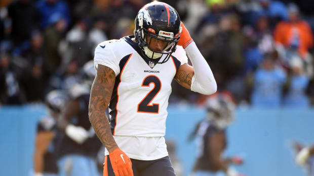 Denver Broncos cornerback Pat Surtain II (2) reacts after a touchdown by Tennessee Titans wide receiver Nick Westbrook-Ikhine (15) during the second half at Nissan Stadium.