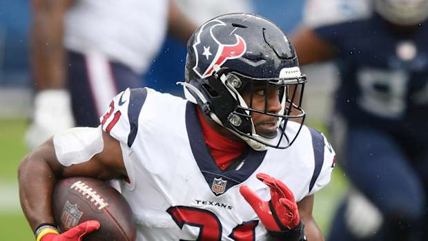 David Johnson running the ball with the Texans.