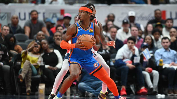 Nov 16, 2022; Washington, District of Columbia, USA; Oklahoma City Thunder guard Shai Gilgeous-Alexander (2) looks to shoot on Washington Wizards forward Kyle Kuzma (33) during the fourth quarter at Capital One Arena. Mandatory Credit: Tommy Gilligan-USA TODAY Sports