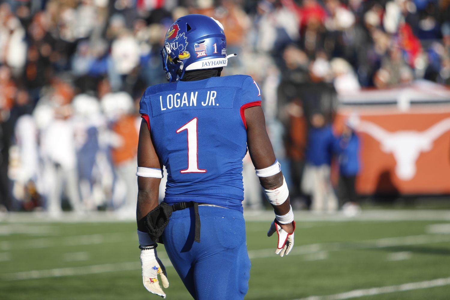 Kenny Logan Jr. awaits the start of a play  in the first half against the Texas Longhorns in David Booth Kansas Memorial Stadium on November 19, 2022.