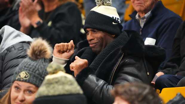 Jan 13, 2024; Boulder, Colorado, USA; Colorado Buffaloes football head coach Deion Sander dances in the first half of the game against the USC Trojans at the CU Events Center