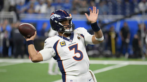 Dec 16, 2023; Detroit, Michigan, USA; Denver Broncos quarterback Russell Wilson (3) warms up before a game against the Detroit Lions at Ford Field.