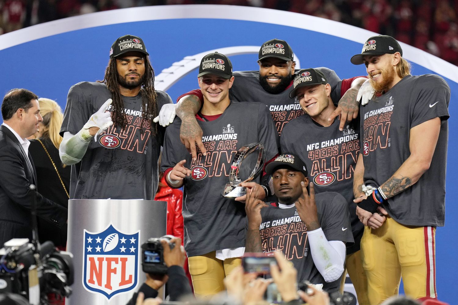 Jan 28, 2024; Santa Clara, California, USA; (Left to right) San Francisco 49ers linebacker Fred Warner (54), quarterback Brock Purdy (13), offensive tackle Trent Williams (71), wide receiver Deebo Samuel (19), running back Christian McCaffrey (23), tight end George Kittle (85) celebrate after winning the NFC Championship football game against the Detroit Lions at Levi's Stadium. Mandatory Credit: Kyle Terada-USA TODAY Sports