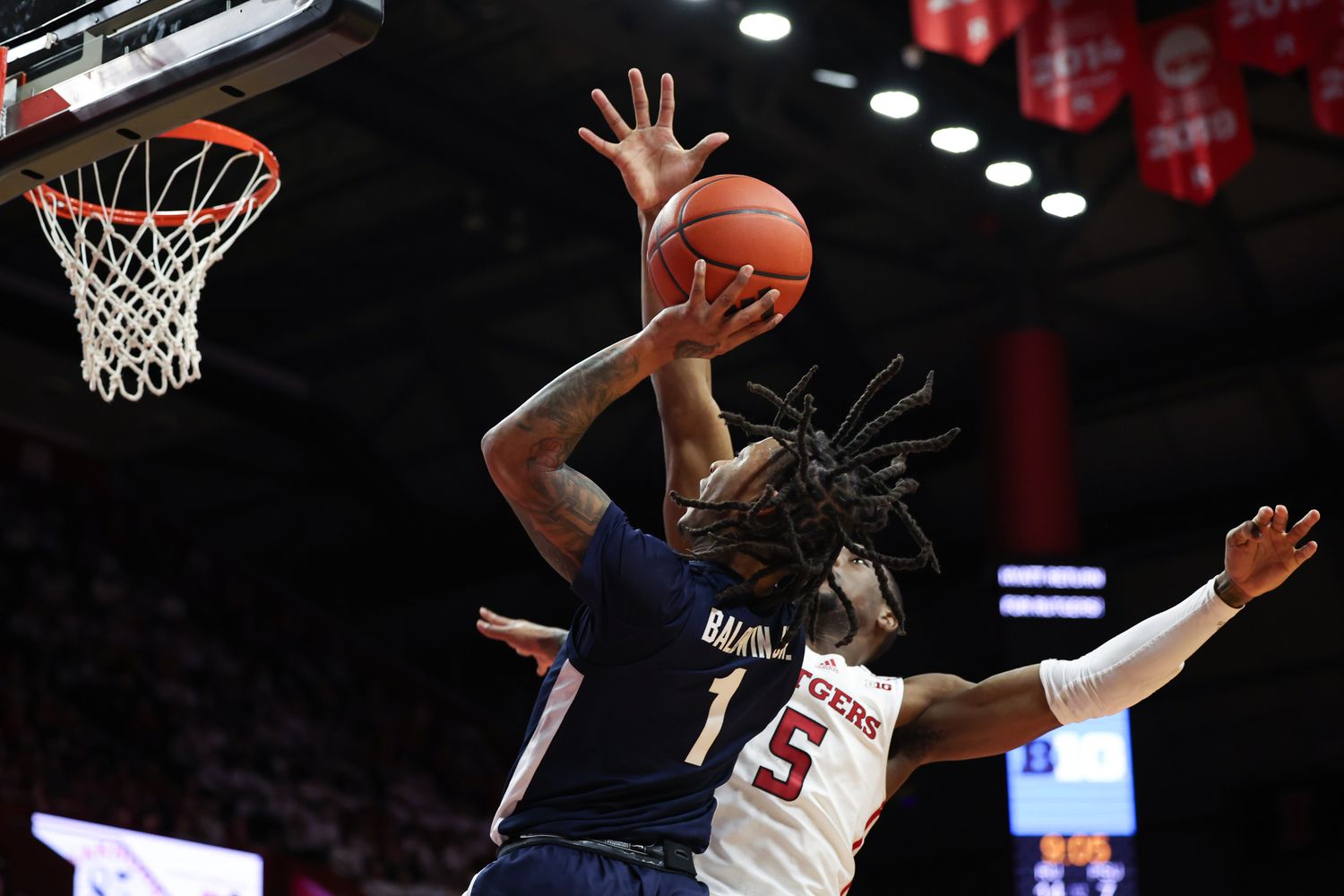 Penn State's Ace Baldwin Jr. drives to the basket against Rutgers in a Big Ten men's basketball game.
