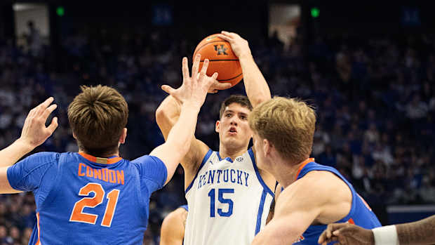 Kentucky's Reed Sheppard (15) launched a three as the Kentucky Wildcats battled the Florida Gators Wednesday night at Rupp Arena. Jan. 31, 2024