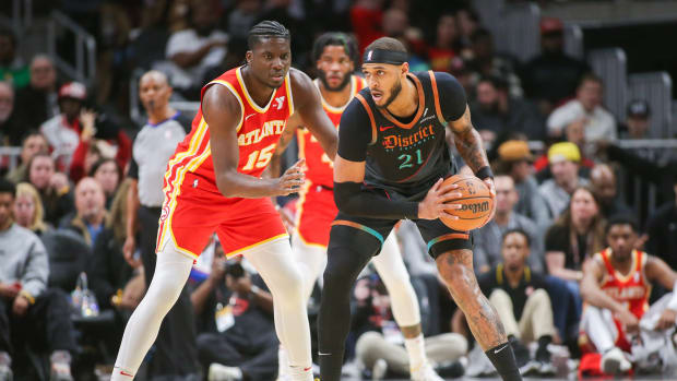 Jan 13, 2024; Atlanta, Georgia, USA; Atlanta Hawks center Clint Capela (15) defends Washington Wizards center Daniel Gafford (21) in the second quarter at State Farm Arena.