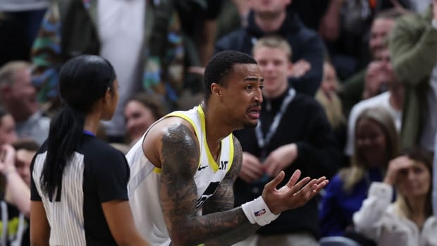 Feb 1, 2024; Salt Lake City, Utah, USA; Utah Jazz forward John Collins (20) reacts to being called for a foul against the Philadelphia 76ers during the fourth quarter at Delta Center.