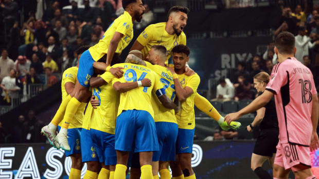 Al Nassr's players pictured celebrating a goal during a 6-0 win over Inter Miami in Saudi Arabia in February 2024