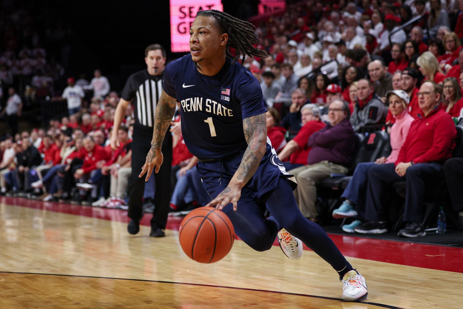 Penn State guard Ace Baldwin Jr. drives to the basket against Rutgers in a Big Ten men's basketball game.