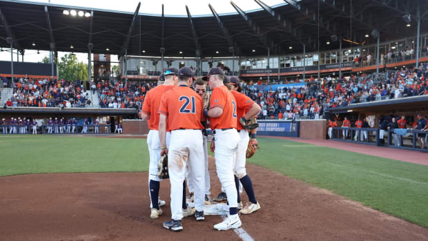 The Virginia baseball team huddles before the game against East Carolina in the Charlottesville Regional Final at the 2023 NCAA Baseball Tournament at Disharoon Park.