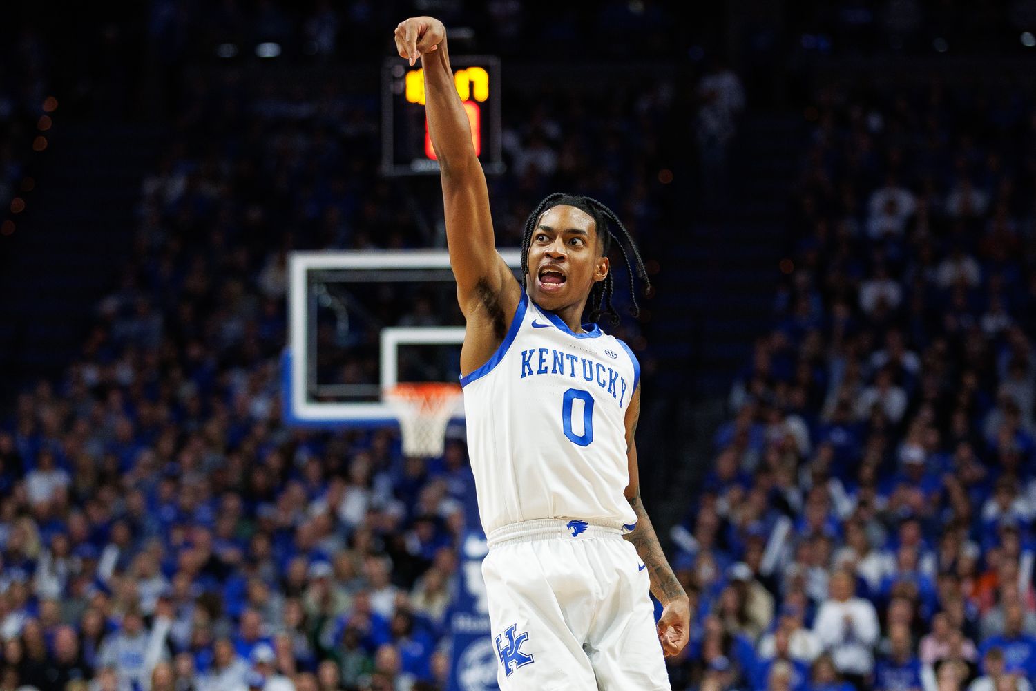 Jan 31, 2024; Lexington, Kentucky, USA; Kentucky Wildcats guard Rob Dillingham (0) makes a three point basket during the second half against the Florida Gators at Rupp Arena at Central Bank Center. Mandatory Credit: Jordan Prather-USA TODAY Sports