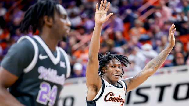 Oklahoma State guard Quion Williams (5) celebrates after dunking the ball in the second half during an NCAA basketball game between Oklahoma State (OSU) and Kansas State (KSU) at the Gallagher-Iba Arena in Stillwater Okla., on Saturday, Feb. 3, 2024.