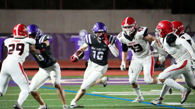 Notre Dame Prep Saints wide receiver Cooper Perry (10) carries the ball against the Brophy Prep Broncos during a game played at Notre Dame Prep in Scottsdale on Sept. 22, 2023.