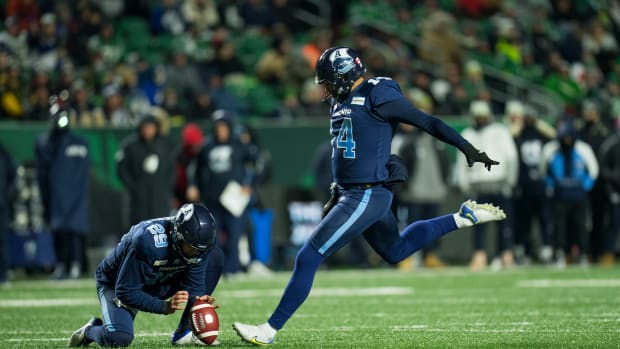 Nov 20, 2022; Regina, CAN; Toronto Argonauts kicker Boris Bede (14) kicks a field goal against the Winnipeg Blue Bombers in the second half. The Argonauts defeated the Blue Bombers to win the 2022 Grey Cup Championship at Mosaic Stadium. Toronto won 24-23. Mandatory Credit: Bob Frid-USA TODAY Sports