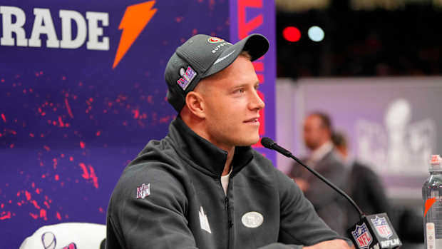 Feb 5, 2024; Las Vegas, NV, USA; San Francisco 49ers running back Christian McCaffrey (23) talks to the media during Super Bowl LVIII Opening Night at Allegiant Stadium. Mandatory Credit: Lucas Peltier-USA TODAY Sports