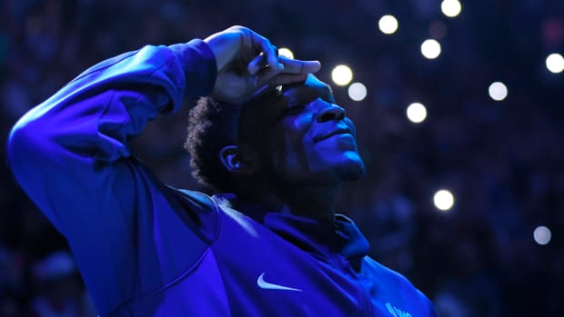 Feb 2, 2024; Minneapolis, Minnesota, USA; Minnesota Timberwolves guard Anthony Edwards (5) salutes the fans as he is introduced as an all-star before the game with the Orlando Magic at Target Center. (Bruce Kluckhohn / USA TODAY Sports).