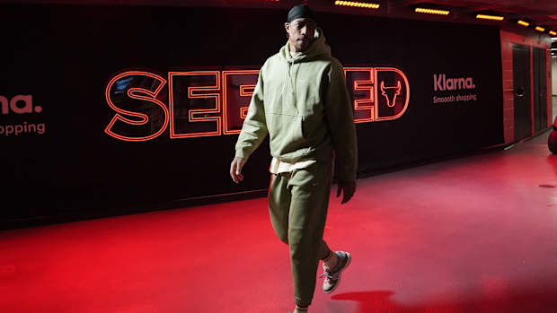 Chicago Bulls forward DeMar DeRozan (11) enters the building before the game against the Minnesota Timberwolves at United Center.