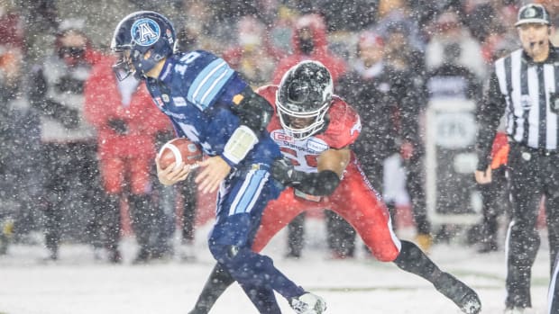 Nov 26, 2017; Ottawa, Ontario, CAN; Calgary Stampeders linebacker Jameer Thurman (56) sacks Toronto Argonauts quarterback Ricky Ray (15) during the first half of the Grey Cup championship at TD Place Stadium. Mandatory Credit: Marc DesRosiers-USA TODAY Sports  