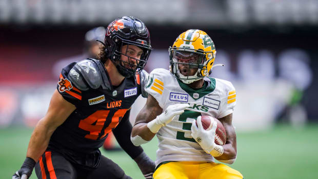 Jun 17, 2023; Vancouver, British Columbia, CAN; BC Lions linebacker Ben Hladik (46) prepares to tackle Edmonton Elks receiver Kyran Moore (3) in the second half at BC Place. BC won 22-0. Mandatory Credit: Bob Frid-USA TODAY Sports  