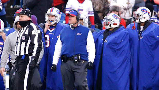Dec 24, 2016; Orchard Park, NY, USA; Buffalo Bills head coach Rex Ryan (wearing vest) on the sideline during the second half against the Miami Dolphins at New Era Field. The Dolphins beat the Bills 34-31 in overtime.