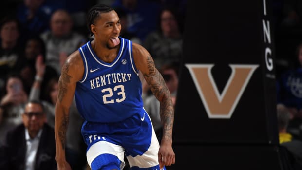 Feb 6, 2024; Nashville, Tennessee, USA; Kentucky Wildcats guard Jordan Burks (23) celebrates after a dunk during the second half against the Vanderbilt Commodores at Memorial Gymnasium. Mandatory Credit: Christopher Hanewinckel-USA TODAY Sports