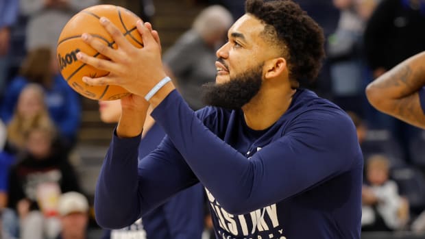 Feb 4, 2024; Minneapolis, Minnesota, USA; Minnesota Timberwolves forward Karl-Anthony Towns (32) warms up before a game the Houston Rockets at Target Center.