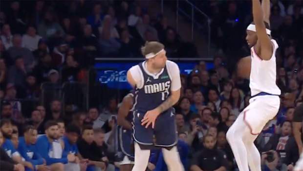 Dallas Mavericks’ Luka Doncic passes against New York Knicks’ Precious Achiuwa