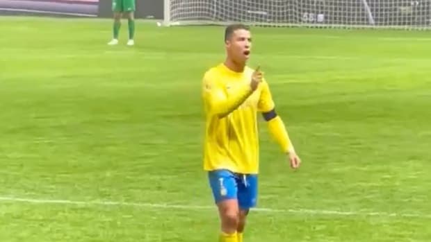 Al Nassr captain Cristiano Ronaldo pictured waving his finger while shouting at Al-Hilal fans after they chanted "Messi, Messi, Messi" during a game in the 2024 Riyadh Season Cup