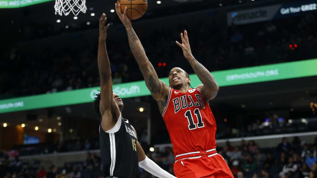Chicago Bulls forward DeMar DeRozan (11) drives to the basket as Memphis Grizzlies forward GG Jackson (45) defends during the second half at FedExForum.