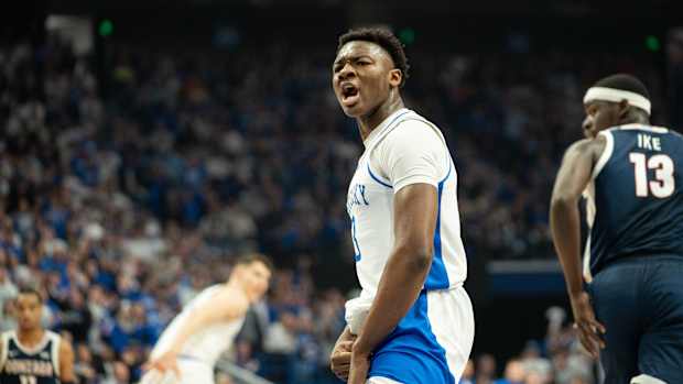 Kentucky Wildcats guard Adou Thiero (3) celebrates his dunk during their game against the Gonzaga Bulldogs on Saturday, Feb. 10, 2024 at Rupp Arena.