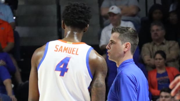 Florida forward Tyrese Samuel and head coach Todd Golden