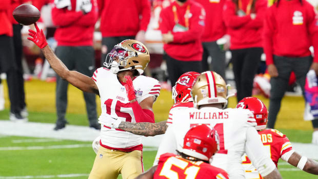 Jauan Jennings throws a touchdown pass in Super Bowl LVIII.