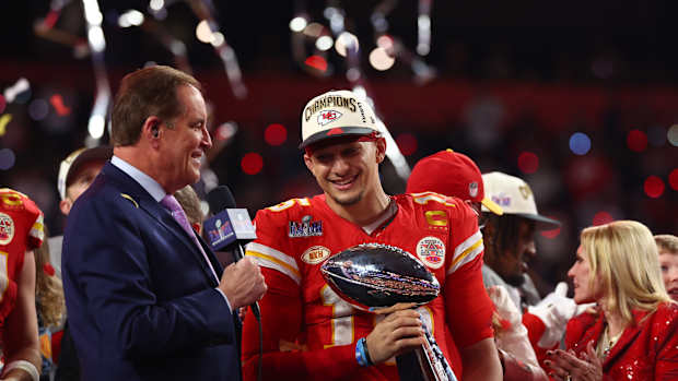 Feb 11, 2024; Paradise, Nevada, USA; Kansas City Chiefs quarterback Patrick Mahomes (15) celebrates with the Vince Lombardi Trophy after defeating the San Francisco 49ers in Super Bowl LVIII at Allegiant Stadium. Mandatory Credit: Mark J. Rebilas-USA TODAY Sports  