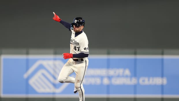 Edouard Julien celebrates his home run