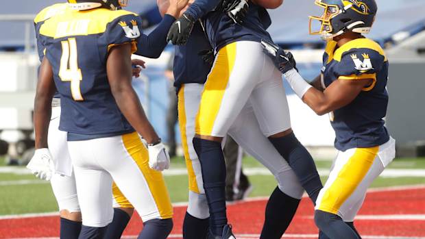 The Memphis Showboats wide receiver Ryan McDaniel (18) celebrates after catching a touchdown pass against the Philadelphia Stars at the Simmons Liberty Bank Stadium in Memphis. Memphis Showboats  