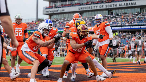 Brevyn Spann-Ford celebrates his touchdown catch